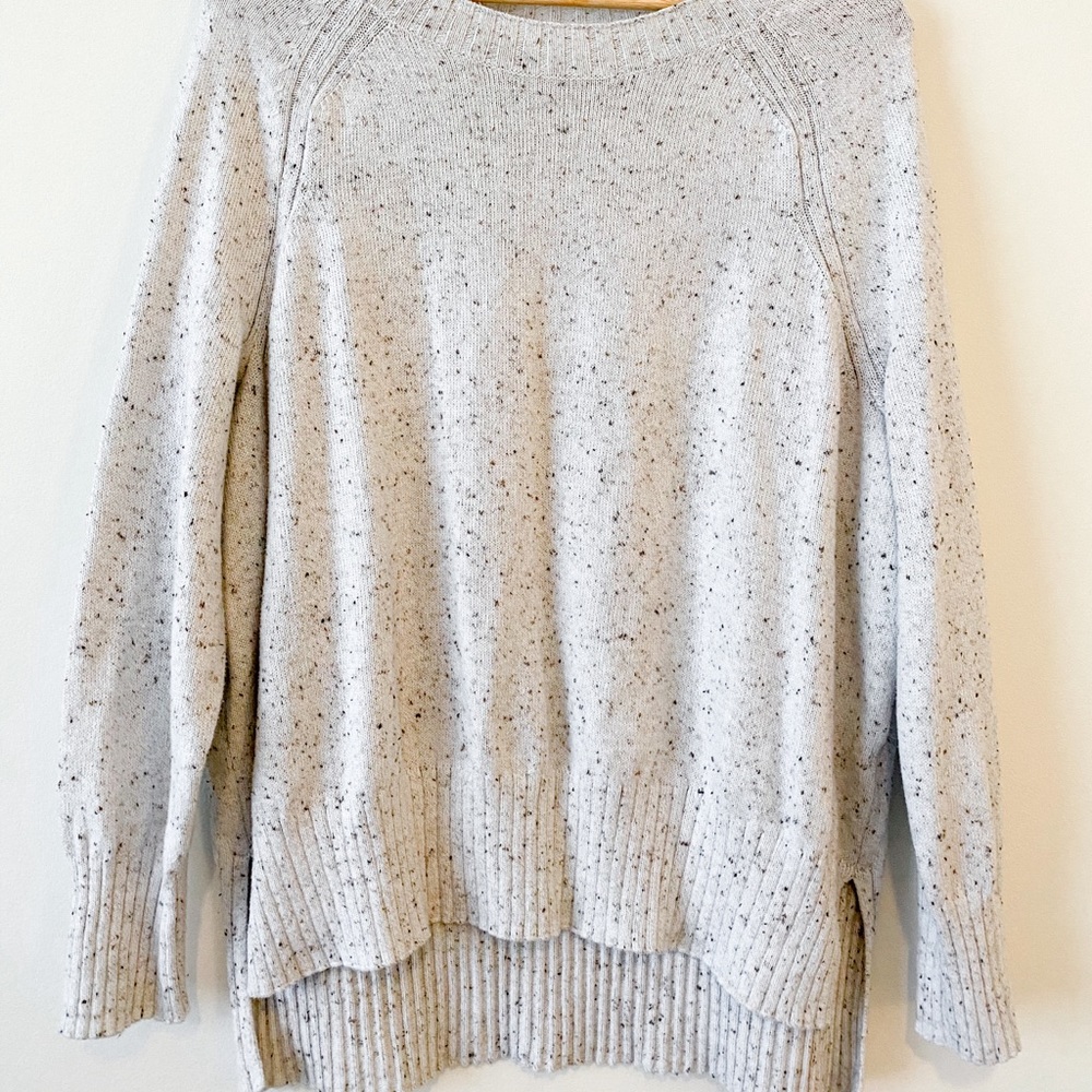 Cream Sweater with Varying Colors of String
